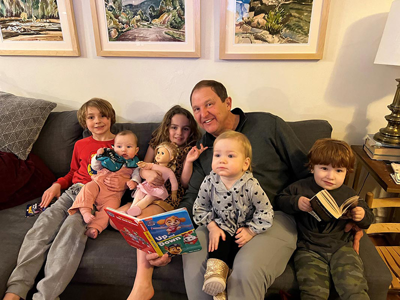 Chuck reading to his grandkids